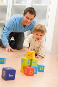 Get down on the floor and stack blocks!