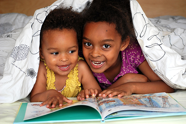 kids reading books in bed 2021 08 29 22 31 11 utc
