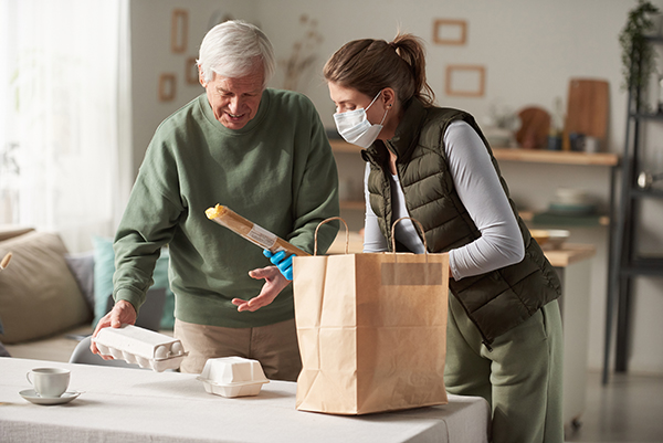 volunteer helping elderly man 2021 08 31 11 10 40 utc