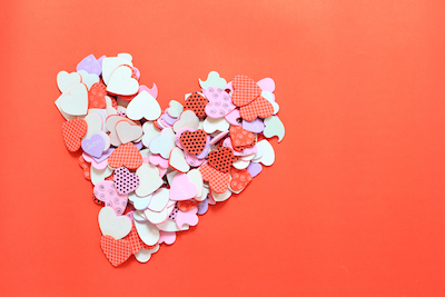 a collage of different hearts for the shape of a big heart on red background