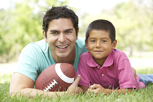 father and son in park