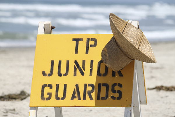 A sign that the Junior Lifeguards are present on the San Diego Beach.