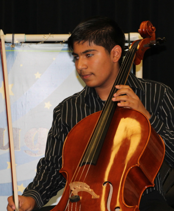 Bruno pauses at a rest while playing his cello.