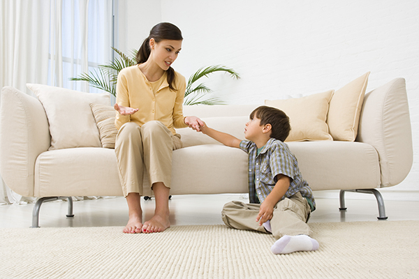 Mother and son discuss the reason for a time-in.
