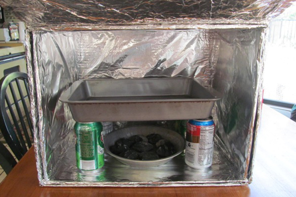 Learn how to make a box oven and cook things using solar power.